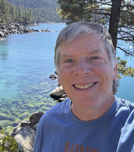 Bob Wick, BLM photographer, at a river in Oregon